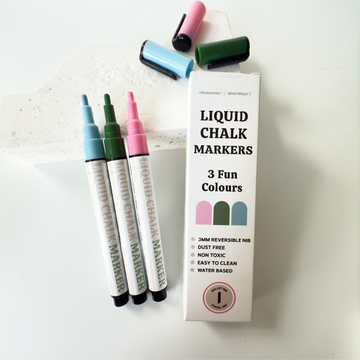 Coloured liquid chalk markers in bold green blue and pink